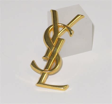 ysl pin brooch.